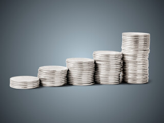 silver color stack of coins gray background