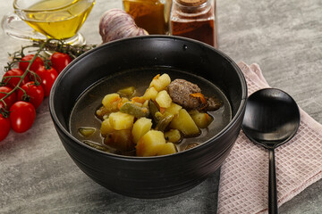 Soup with meatball and potato