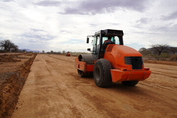 roller machine tractor on the field