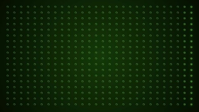 Video animation of an abstract glowing green LED wall with bright light bulbs - abstract background.