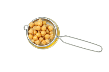 PNG, Aquafaba in glass and chickpeas in sieve, isolated on white background, top view