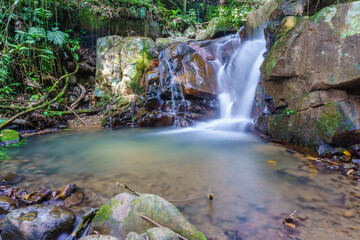 Naklejka na ściany i meble Beautiful waterfall in Borneo jungle
