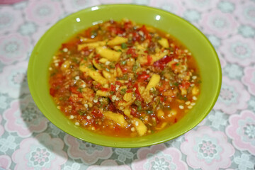 Mango Sambal (a Spicy Mango Relish). Usually eaten together with rice during lunch or dinner.
