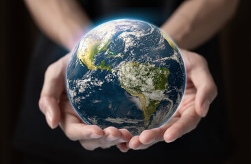 globe blue on hands, earth in adult hands , earth day, world day, energy saving concept, Elements of this image furnished by NASA