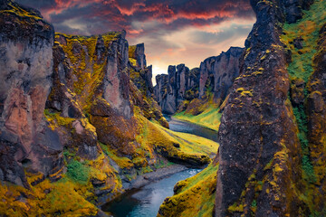 Unbelievable sunset on Fjadrargljufur canyon and river. Extraordinary summer scene of South east...