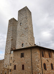 Obraz premium The Salvucci Towers, also called the Twin Towers in the old town of San Gimignano, Tuscany, Italy