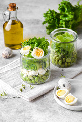 green salad in a jar with edamame beans