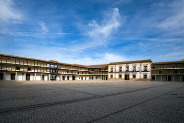 Panoramic view of the monumental Plaza Mayor of Tembleque de Toledo, Castilla la Mancha, Spain, with its wooden balconies and porticos - obrazy, fototapety, plakaty