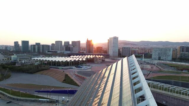 views of barcelona and the barcelona forum park at sunset
