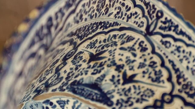 Rack focus over a beautiful piece of mexican Talavera, also known as Chinese porcelainn