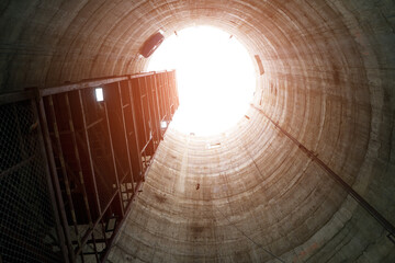 Bottom up view of a vertical mine shaft of Sinking manhole with concrete Wall Friction Staircase...