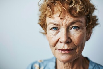 Portrait of a senior woman with freckles on her face