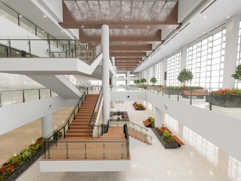 modern office building interior with stairs and plants.