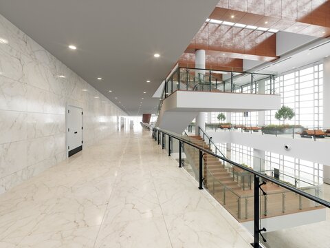 modern office building interior with stairs and plants.
