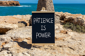 Patience is power symbol. Concept words Patience is power on beautiful black chalk blackboard....