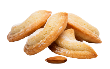 A heap of almond cookies arranged neatly beside a mound of raw almonds