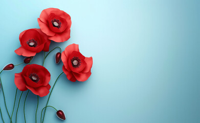 Fototapeta premium Red poppy flowers on blue background