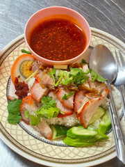 Barbecued red pork in sauce with rice. Cuisine Thailand style on top view. Select and soft focus. 