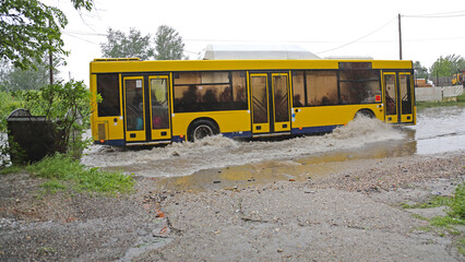 Yellow Bus Driving Through Flooded Road Public Transport Problem