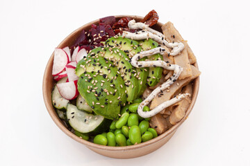 Takeaway vegan poke bowl with heura, avocado, mango and vegetables in recycled kraft paper packaging. Healthy Trendy