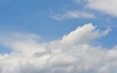 background of white clouds and blue sky
