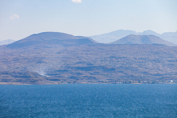Blue water of Lake Sevan and shore in Armenia - 774762341