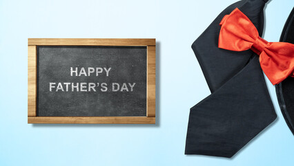 Black hat and red bow tie with a Happy Father's Day message