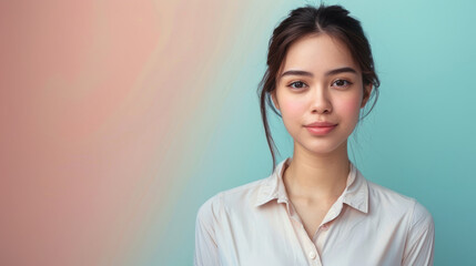   a portrait of a woman in casual attire against a soft pastel-colored background, highlighting an aesthetic of simplicity and approachability. - obrazy, fototapety, plakaty