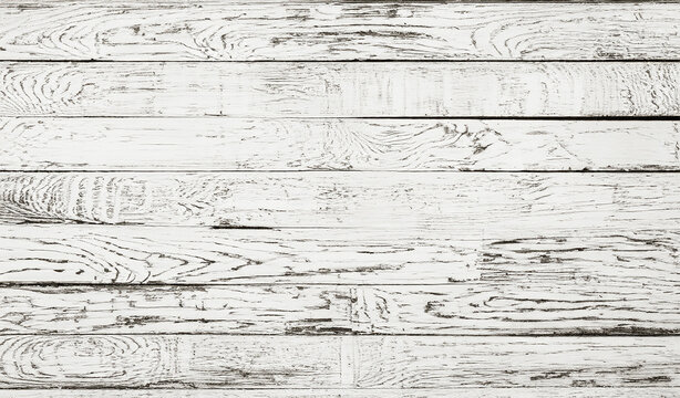 Distressed white painted wood planks, perfect for a shabby chic or rustic look