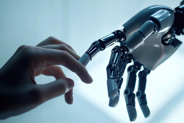 A robotic hand and a human hand touching