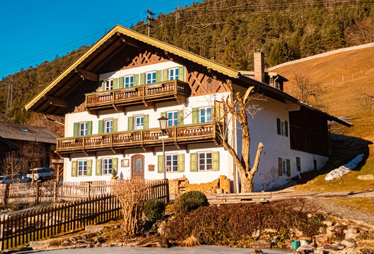 Old buildings on a sunny winter day at Wallgau, Garmisch-Partenkirchen, Werdenfelser Land, Bavaria, Germany