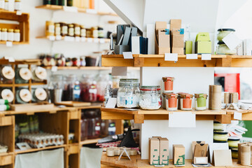 Zero waste shop interior. Wooden shelves with varieties of cosmetic products. - obrazy, fototapety, plakaty