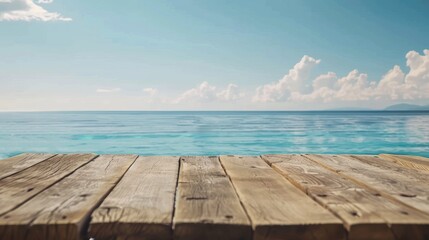 Naklejka na ściany i meble Empty wooden table by the sea calm ocean backdrop