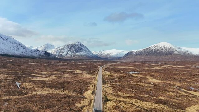 Aerial view of road crossing Rannoch Moor towards Glencoe in Scotland