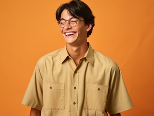 Obraz premium Man in Tan Shirt and Glasses
