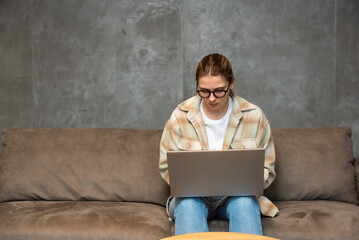 Side hustle money, second job concept. Young university student woman working freelance internet...
