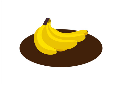 Manojo de pl&aacute;tanos amarillos sobre bandeja marr&oacute;n oscura. Fruta