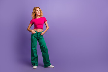Plakaty  Photo of lovely pretty woman wear stylish clothes look empty space news isolated on purple color background