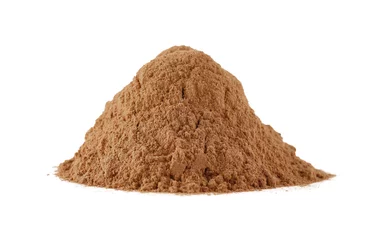 Poster Pile of dry aromatic cinnamon powder isolated on white © New Africa