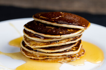 delicious homemade hot pancakes with honey