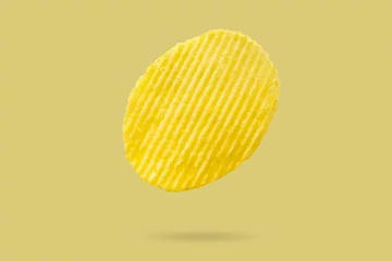 Foto op Aluminium potato chip isolated on yellow background © Piman Khrutmuang