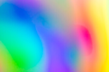 Abstract blur holographic rainbow foil iridescent background