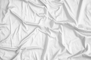 Abstract white wrinkled bedding sheet fabric texture background