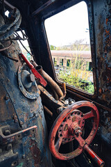 Rusty control wheel on an abandoned machine