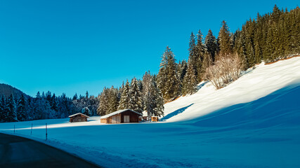 Alpine view on a sunny winter day at Graen, Tannheimer Tal valley, Reutte, Tyrol, Austria