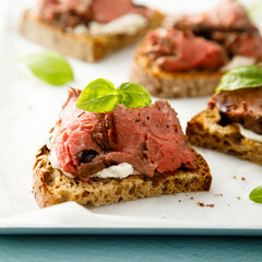 Roast beef on toast with cream cheese and balsamic