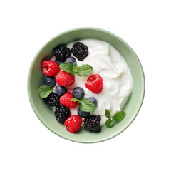 Berries in a bowl of yogurt with mint leaves