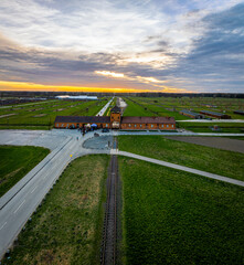 Aerial view of main gate of Nazi death camp at Auschwitz in Oswiecim, a complex of concentration and extermination camps operated by Nazi Germany in occupied Poland
