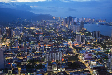Fototapeta na wymiar A view of the cityscape of Penang in Malaysia during the blue hour of the day.