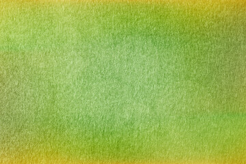 Green yellow felt texture abstract background. Surface of fabric texture in green color. 